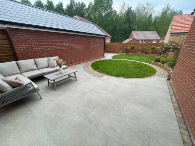 Eden Limestone Porcelain Garden Design in shade Mink with Aura Cobbled Block Paving Borders Porcelain patio | porcelain paving | garden design | essex | paving contractor essex | garden landscapers near me | garden landscapers essex | patio design Garden landscapers Driveway installers Landscapers in essex Garden designers Paving contractors Garden design Paving contractors near me Garden designers near me Garden landscapers near me Elite paving
